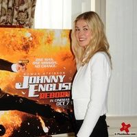 Rosamund Pike at a photocall for the release of Johnny English Reborn | Picture 74944